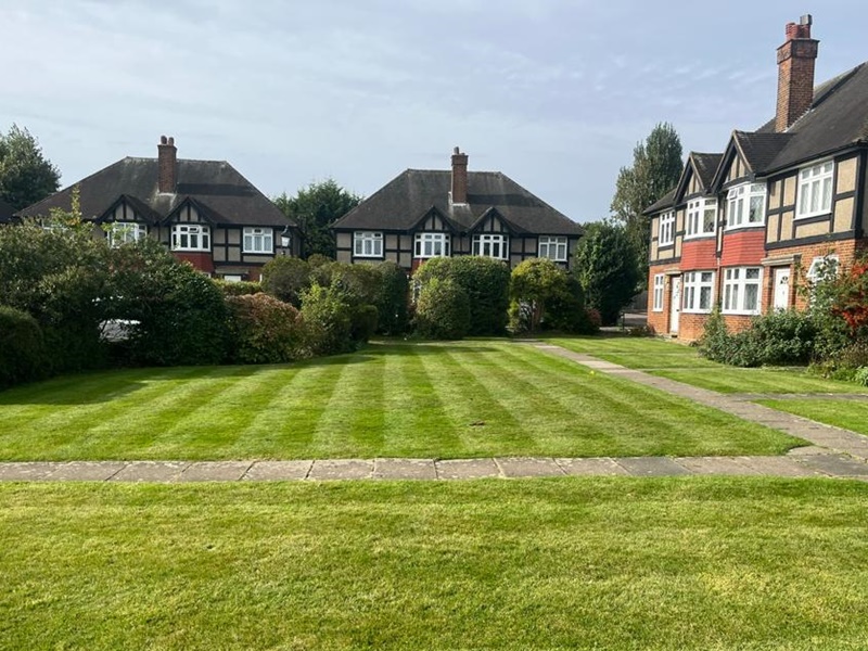 Regular garden maintenance for large green spaces